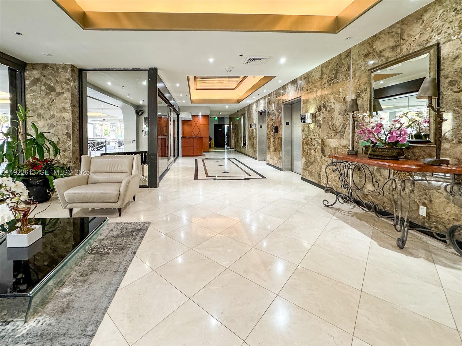 8877 Collins Avenue, Unit 809 Surfside, FL 33154 - Photo 38 of 46 a view of living room filled with furniture