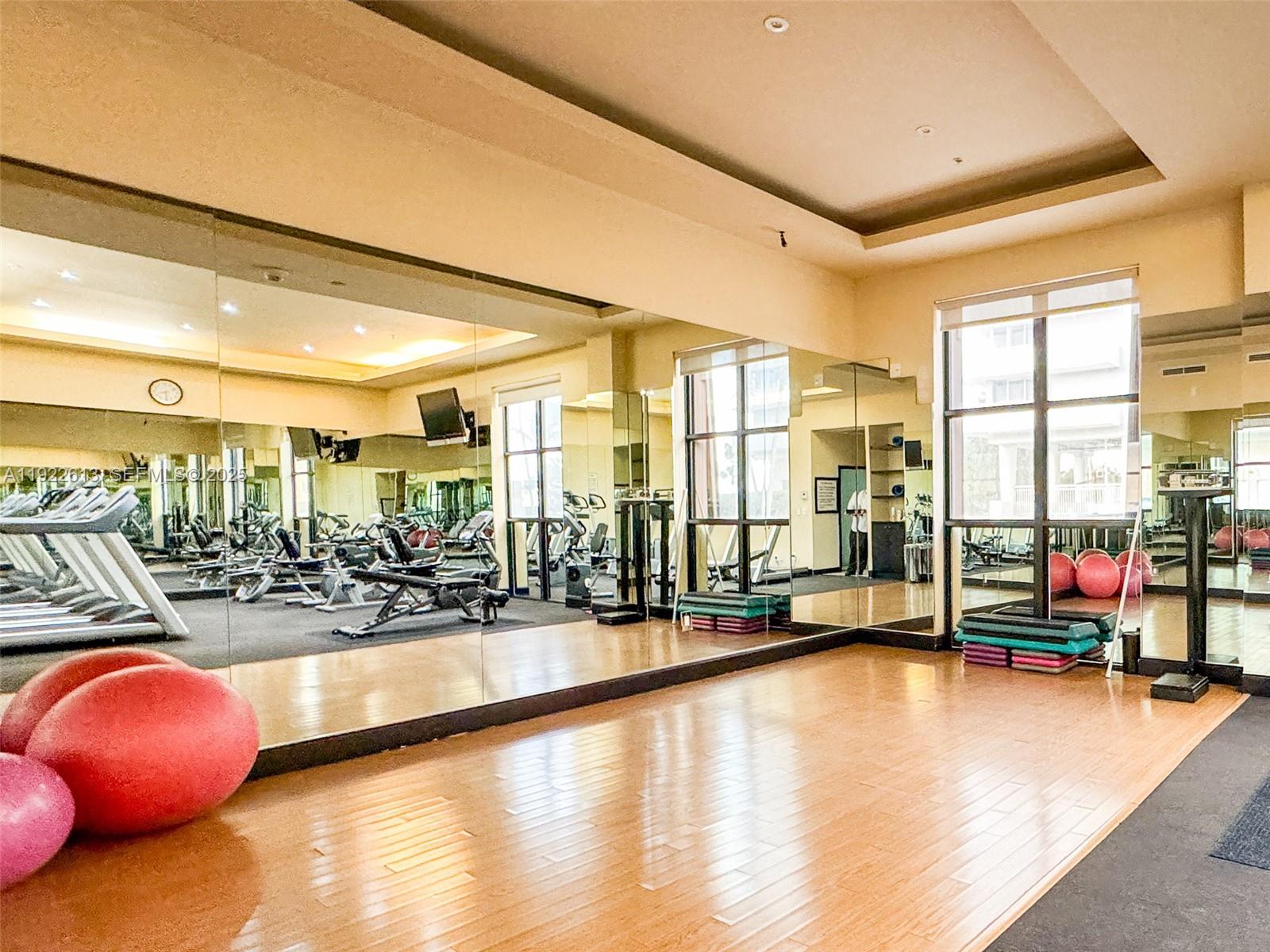8877 Collins Avenue, Unit 809 Surfside, FL 33154 - Photo 42 of 46 a view of a room with gym equipment