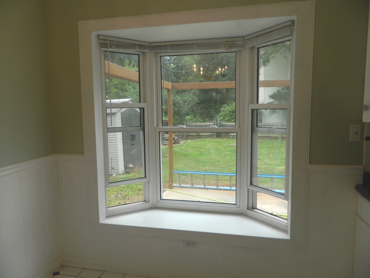 1101 South Raven Road Shorewood, IL 60404 - Photo 15 of 24 a view of a glass door with a yard
