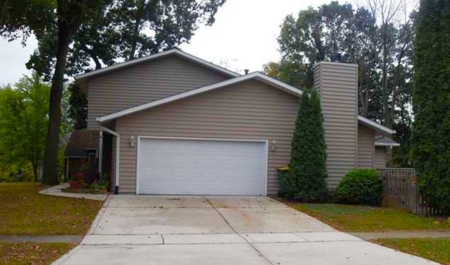 1101 South Raven Road Shorewood, IL 60404 - Photo 5 of 24 a front view of house with yard and trees