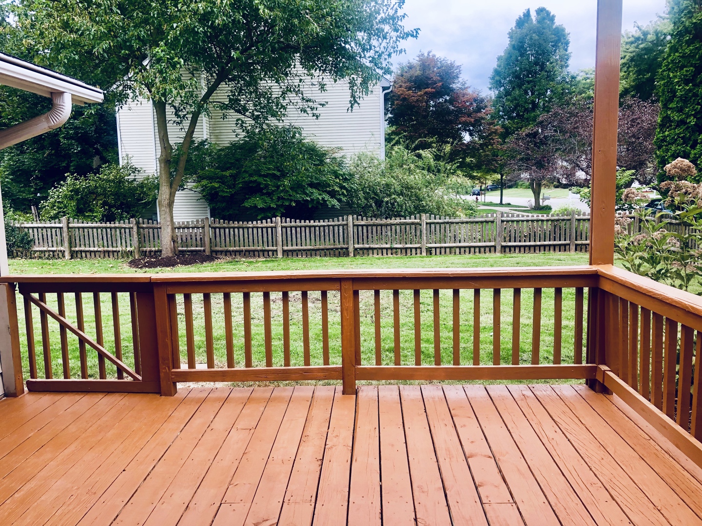 1101 South Raven Road Shorewood, IL 60404 - Photo 6 of 24 a view of balcony with wooden floor and fence