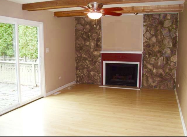 1101 South Raven Road Shorewood, IL 60404 - Photo 10 of 24 a view of a fireplace in a room