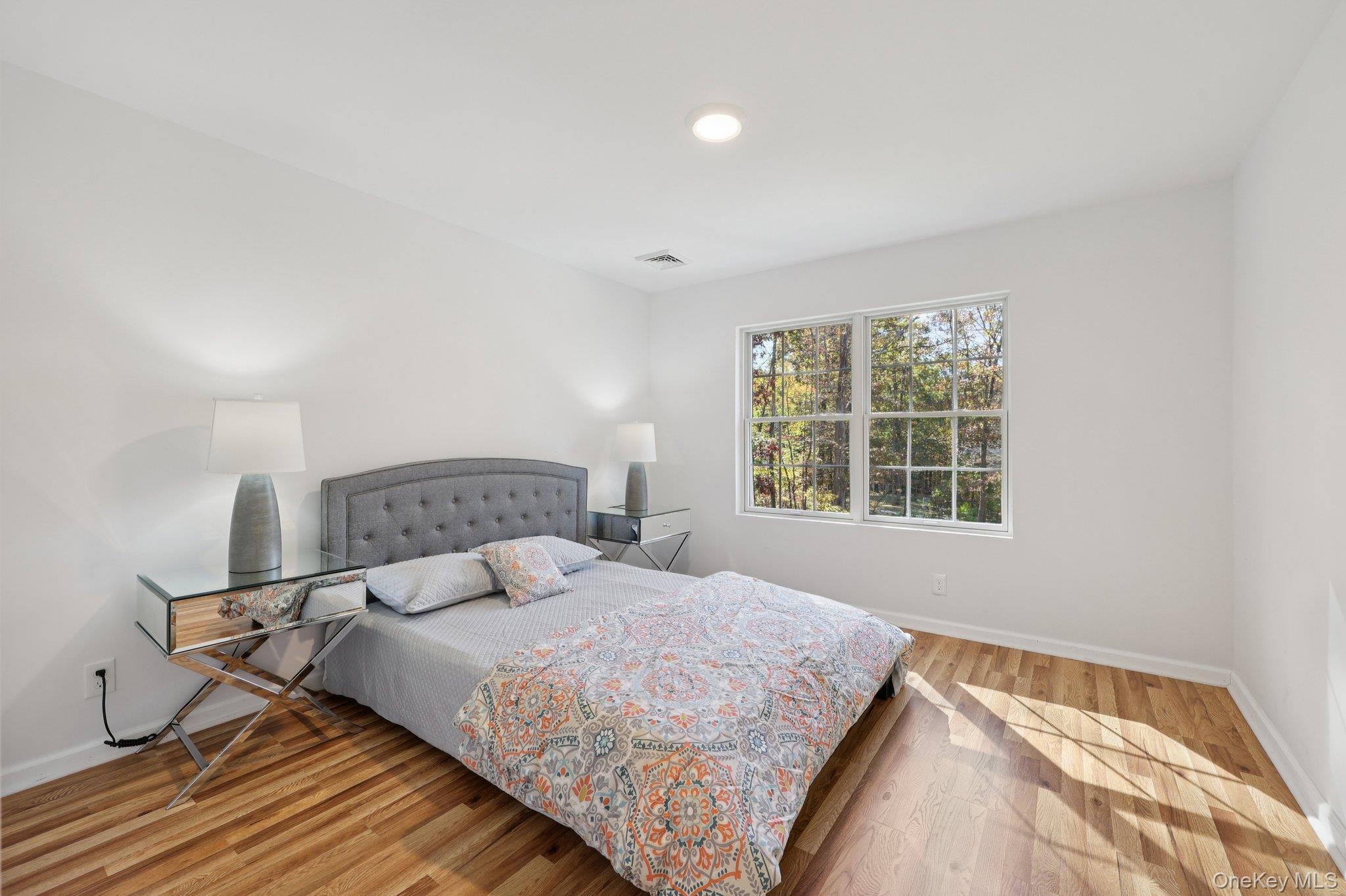 27 Oak Hill Road Monroe, NY 10950 - Photo 21 of 48 a bedroom with a bed and window