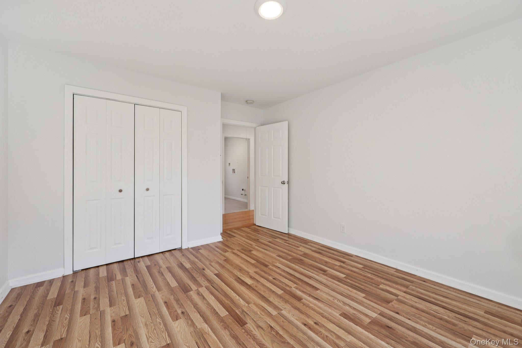 27 Oak Hill Road Monroe, NY 10950 - Photo 26 of 48 a view of an empty room with wooden floor