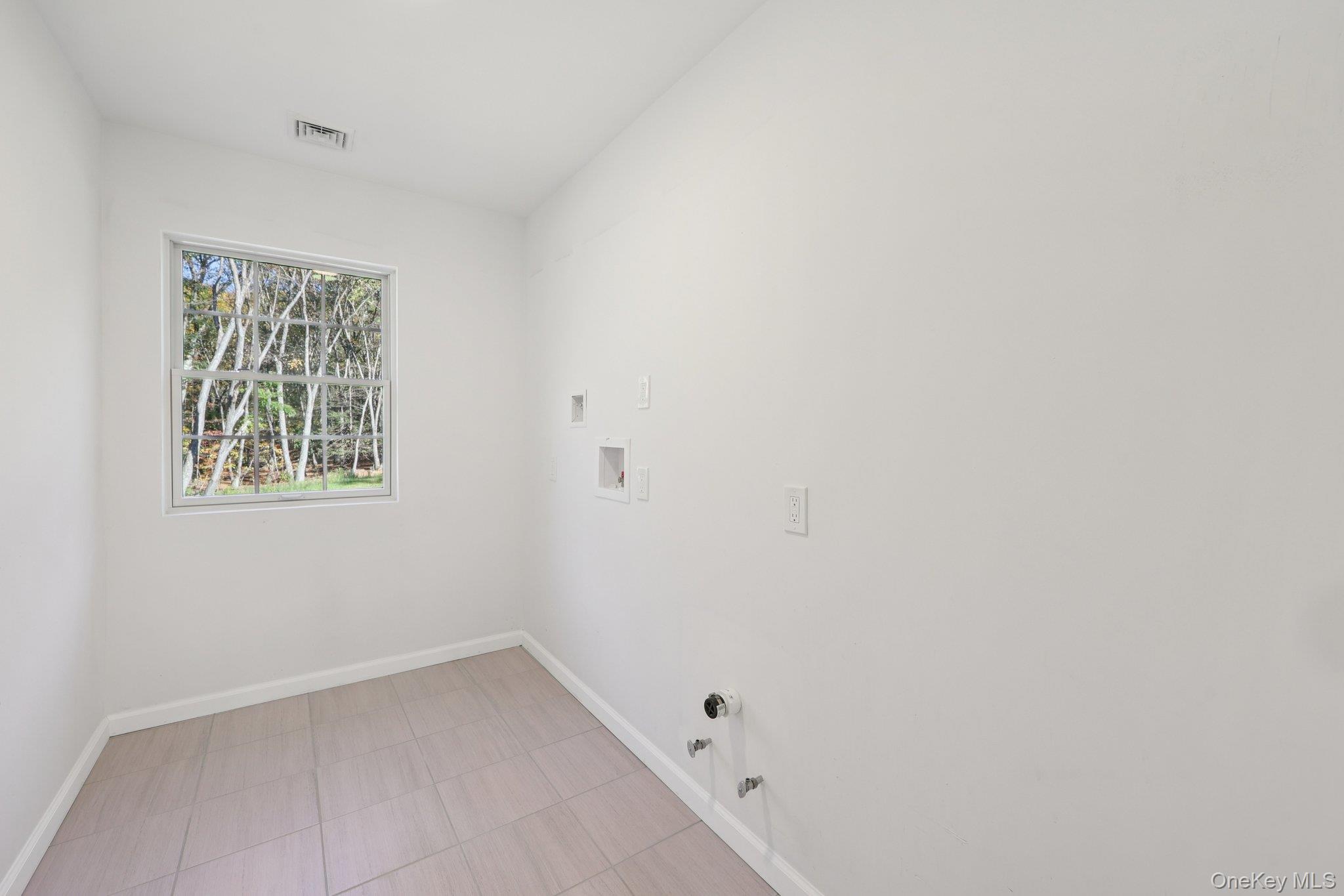 27 Oak Hill Road Monroe, NY 10950 - Photo 38 of 48 a view of an empty room with a window