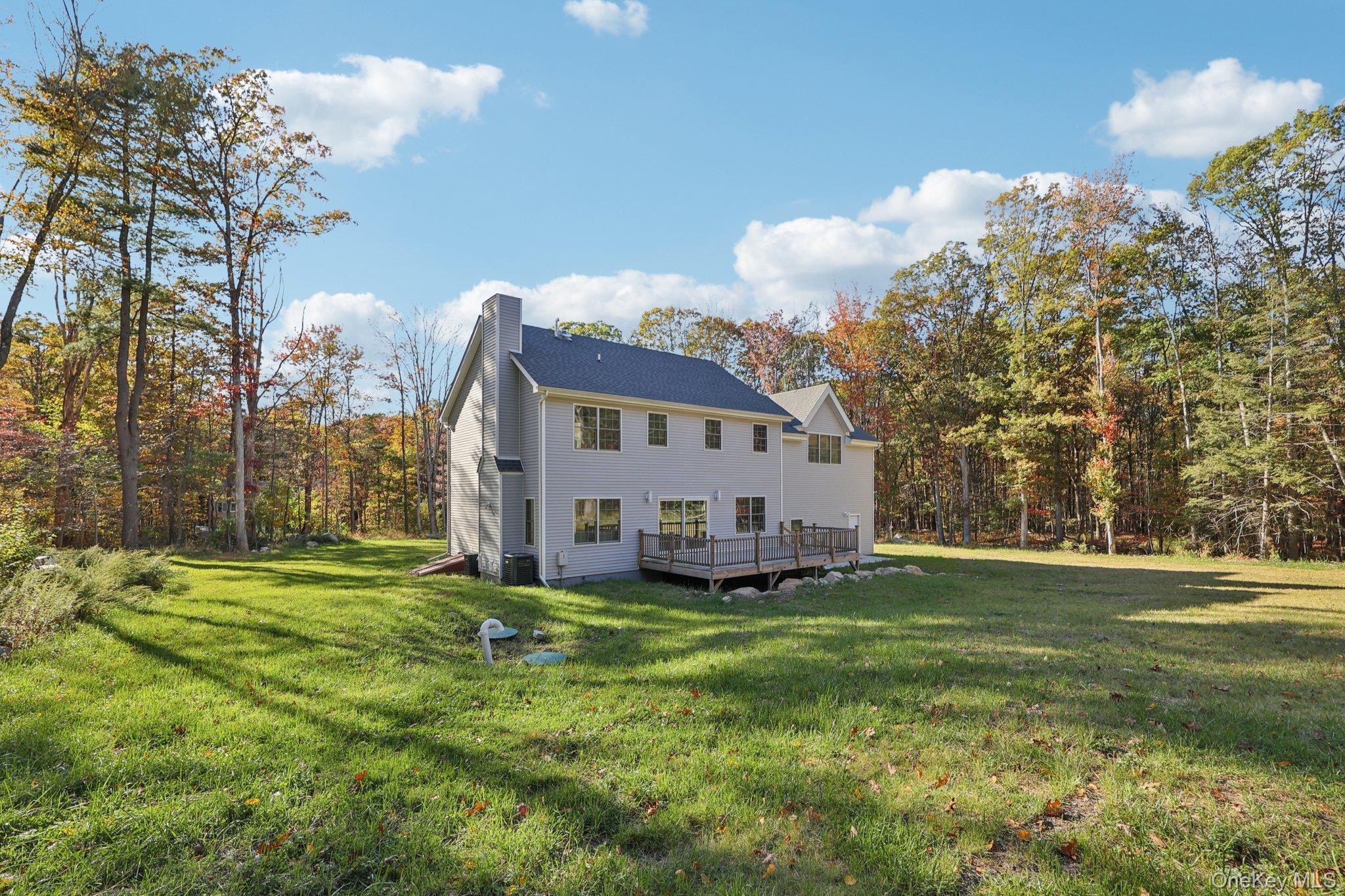 27 Oak Hill Road Monroe, NY 10950 - Photo 42 of 48 a view of a house with a yard