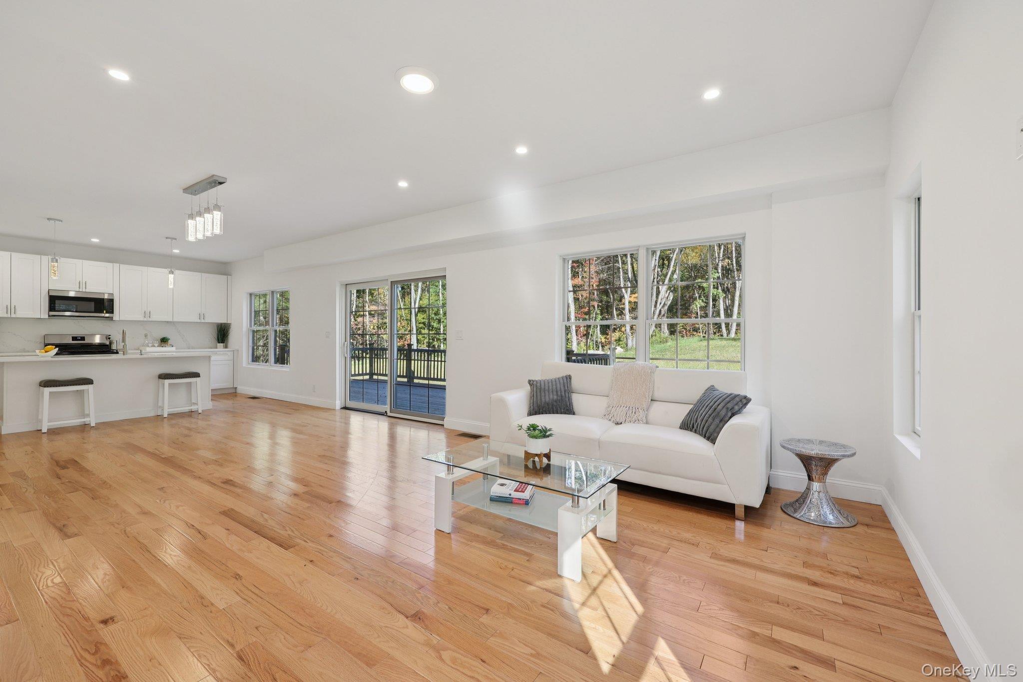 27 Oak Hill Road Monroe, NY 10950 - Photo 7 of 48 a living room with furniture and wooden floor