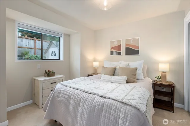 a view of a chairs setting in the back yard of the house