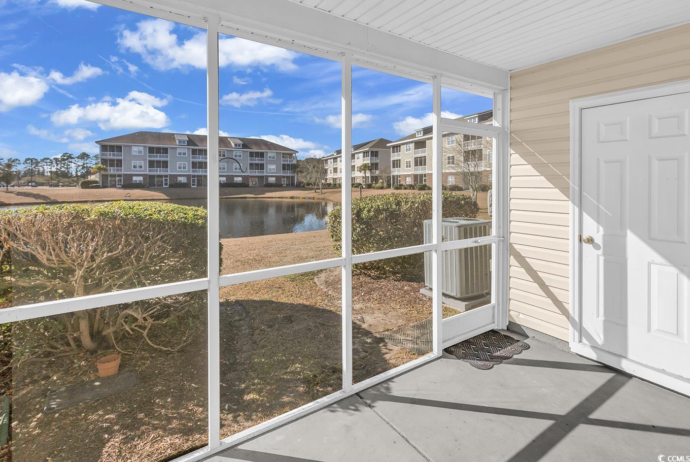 308 Kiskadee Loop, Unit E Conway, SC 29526 - Photo 27 of 36 Unfurnished sunroom featuring a water view