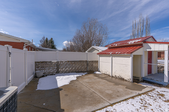 1045 Fox Farm Road Logan, UT 84321 - Photo 60 of 65 Snow covered patio with a patio area