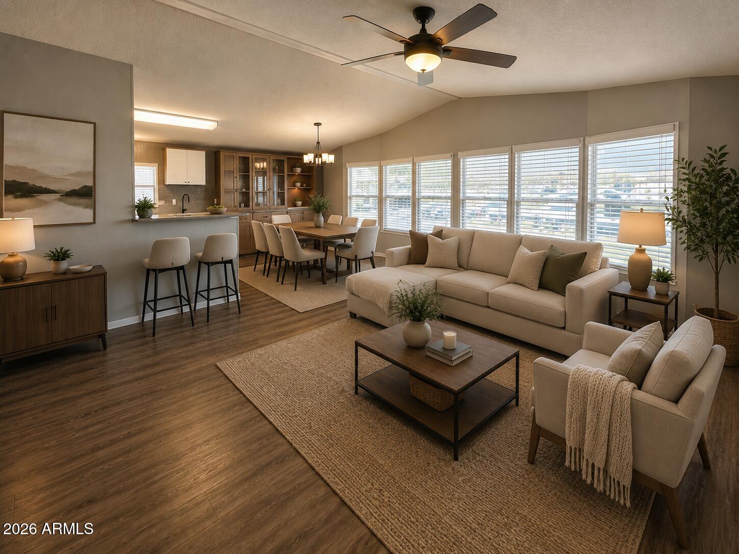 834 South Meridian Road, Unit 105 Apache Junction, AZ 85120 - Photo 4 of 48 a living room with furniture wooden floor and a large window