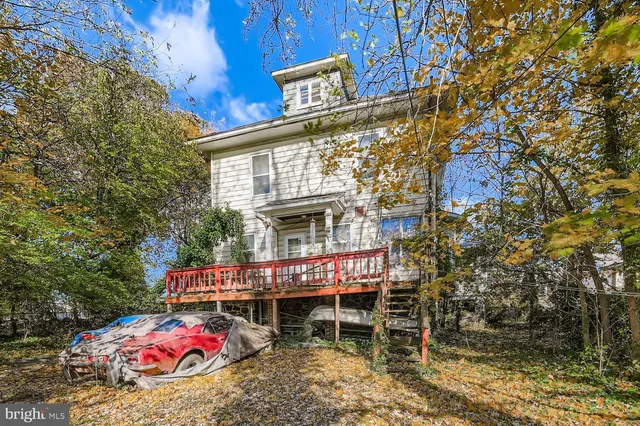 a view of a chairs with table in balcony
