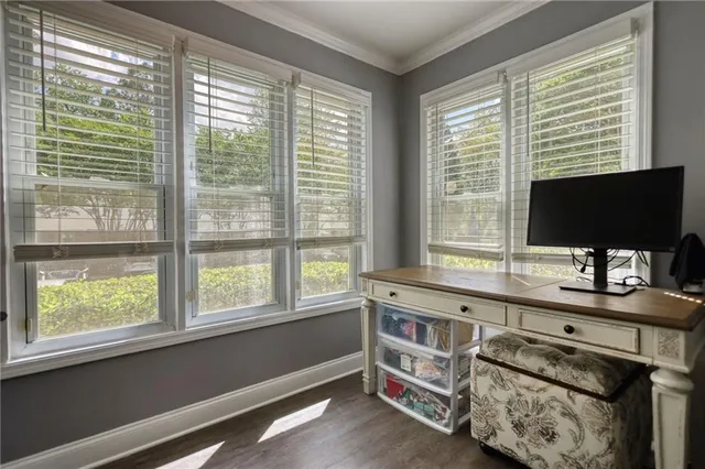 a room with furniture and flat screen tv