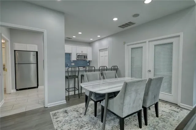 a view of a dining room with furniture