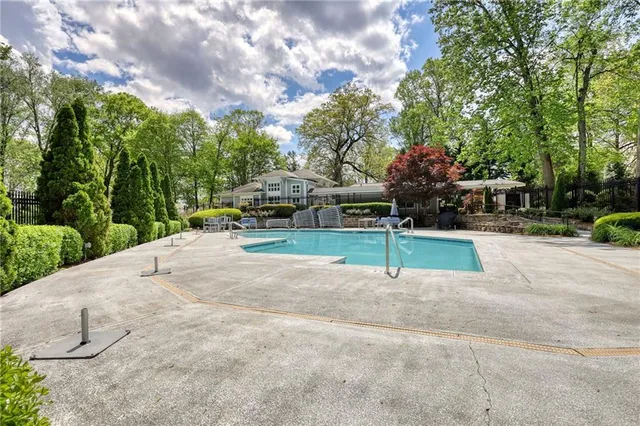 a house with trees in the background
