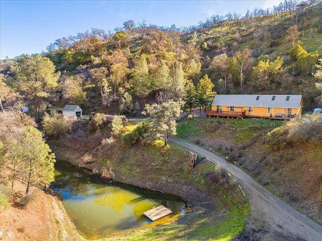 a view of swimming pool from a yard