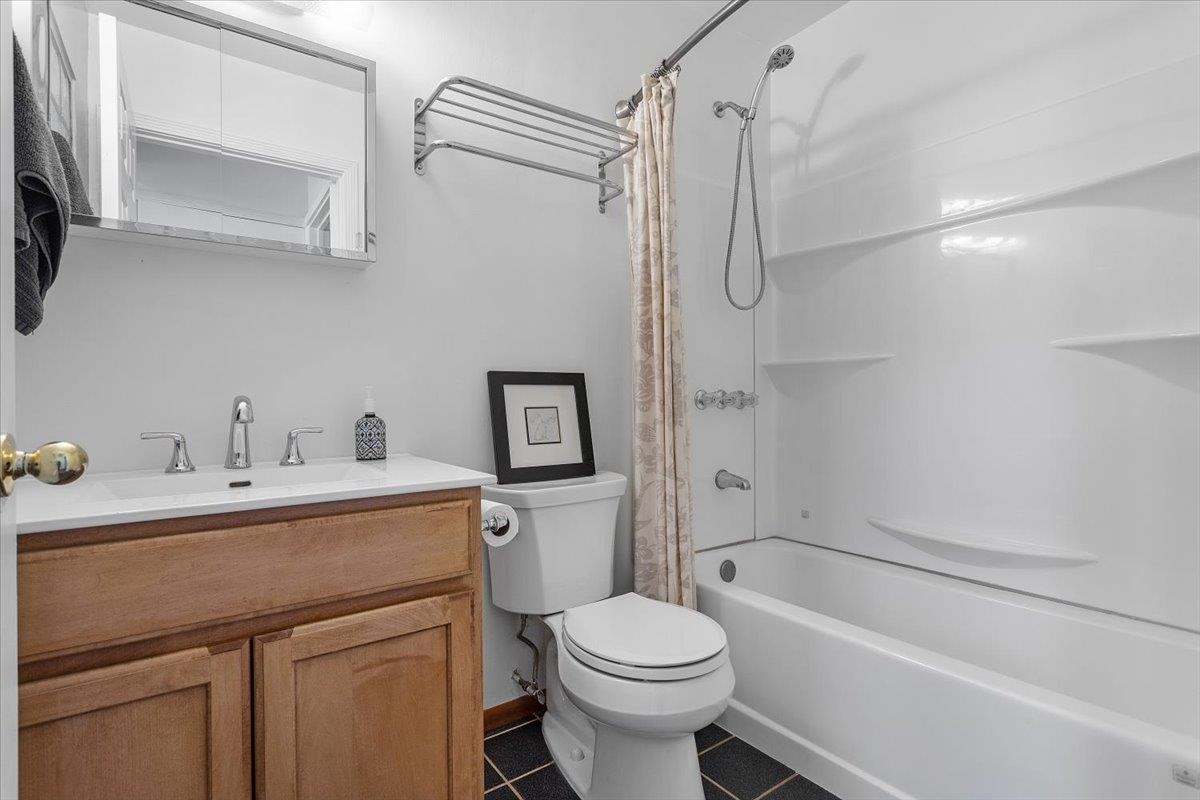 17370 Mines Road Livermore, CA 94550 - Photo 12 of 43 a bathroom with a sink toilet and shower