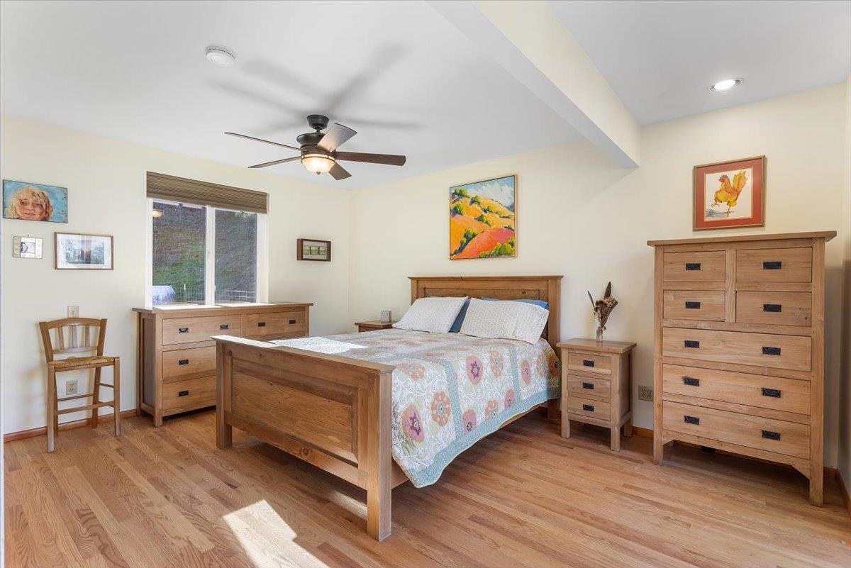 17370 Mines Road Livermore, CA 94550 - Photo 13 of 43 a bedroom with a bed and a dresser