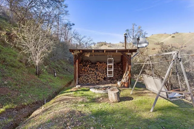a aerial view of a house with a yard