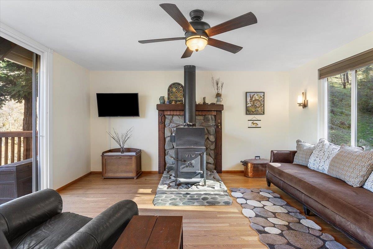 17370 Mines Road Livermore, CA 94550 - Photo 5 of 43 a living room with furniture and a flat screen tv