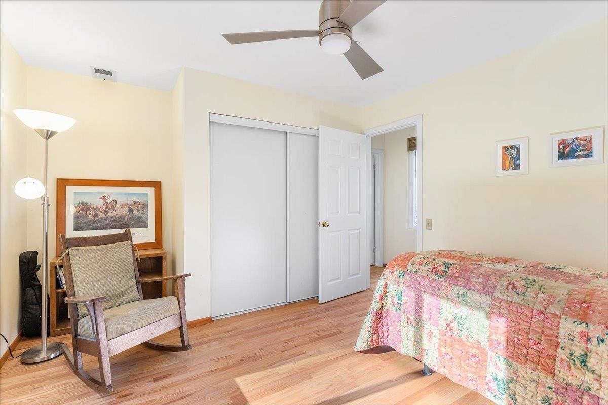 17370 Mines Road Livermore, CA 94550 - Photo 10 of 43 a bedroom with a bed and a chair