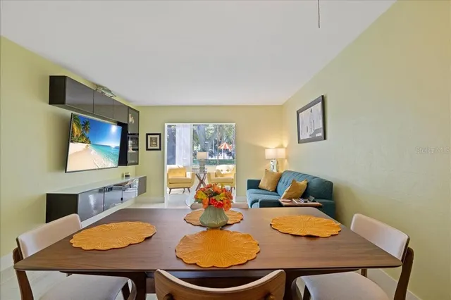 a view of a dining room with furniture