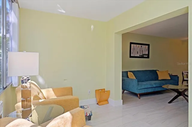 a living room with furniture and a couch