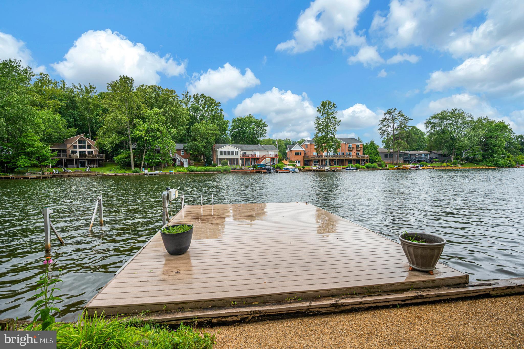 314 Birchside Circle Locust Grove, VA 22508 - Photo 5 of 59 Composite decking on dock with boat lift