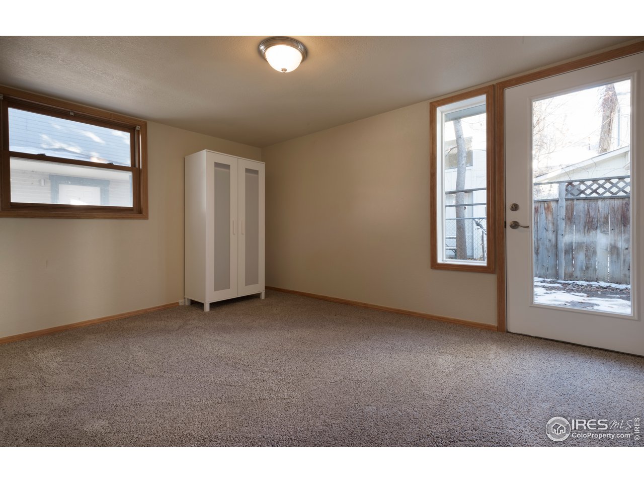 2535 Spruce Street Boulder, CO 80302 - Photo 11 of 17 a view of an empty room with a window