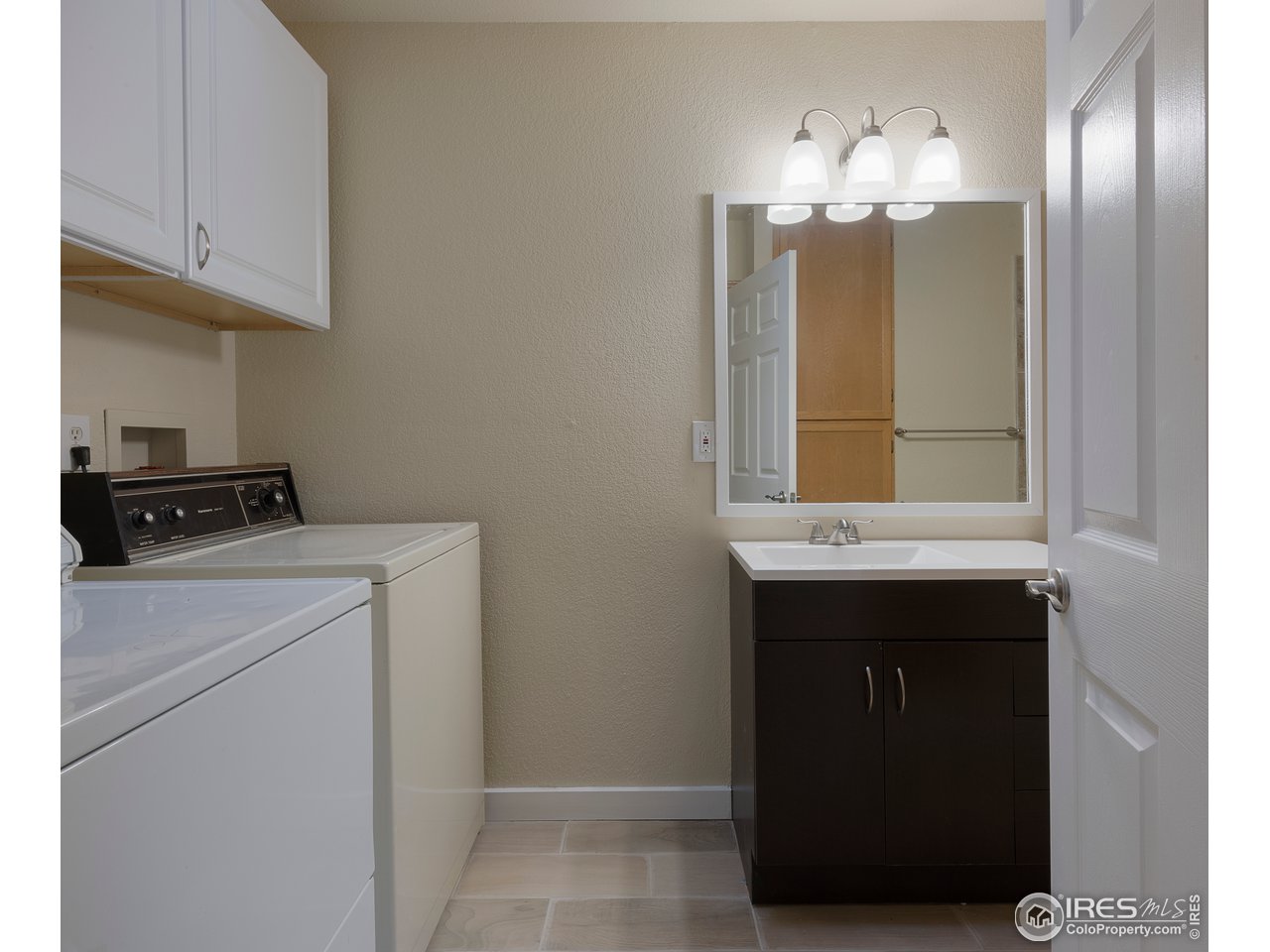 2535 Spruce Street Boulder, CO 80302 - Photo 14 of 17 a kitchen with a sink and cabinets