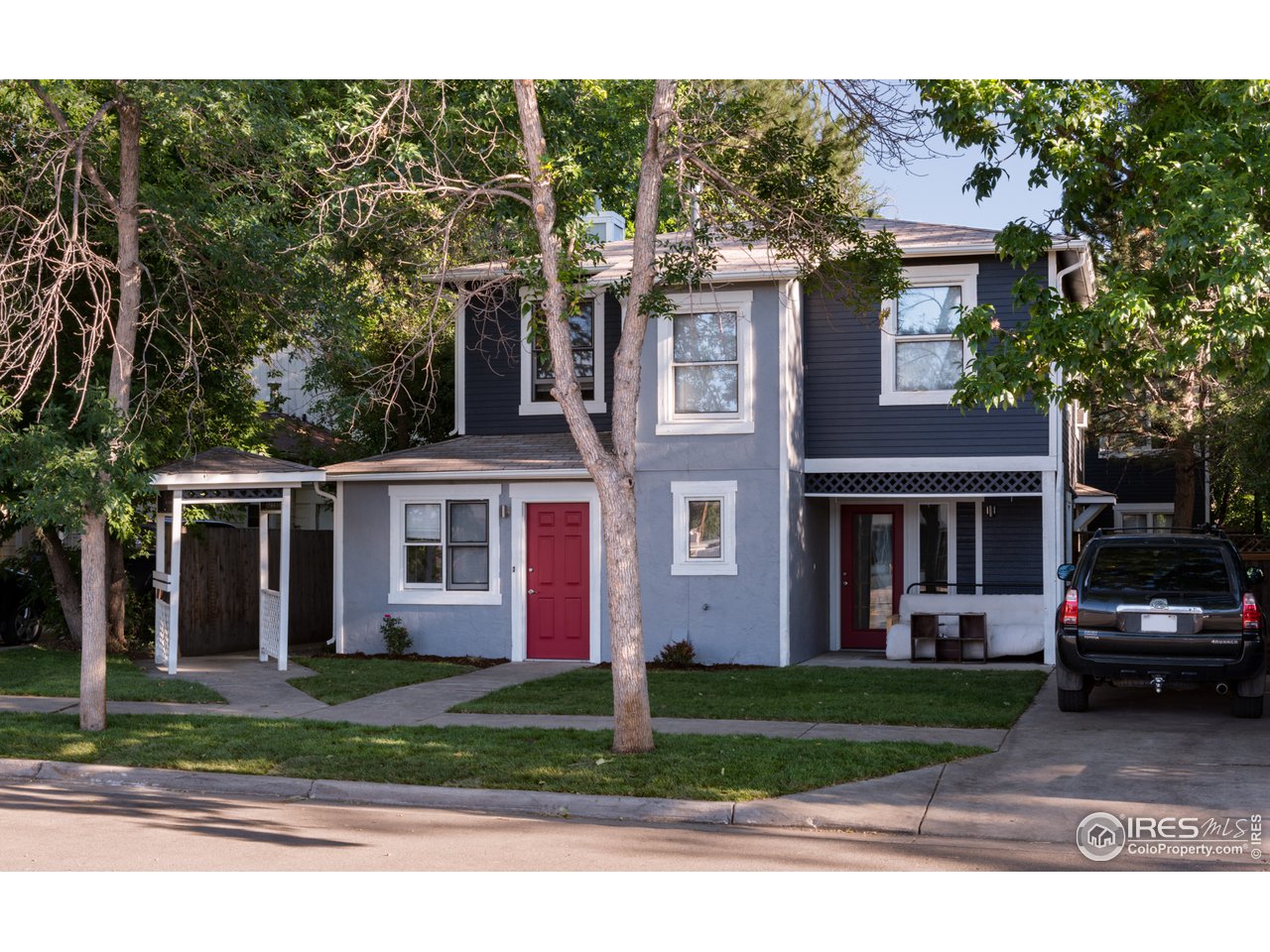 2535 Spruce Street Boulder, CO 80302 - Photo 2 of 17 front view of a house with a yard