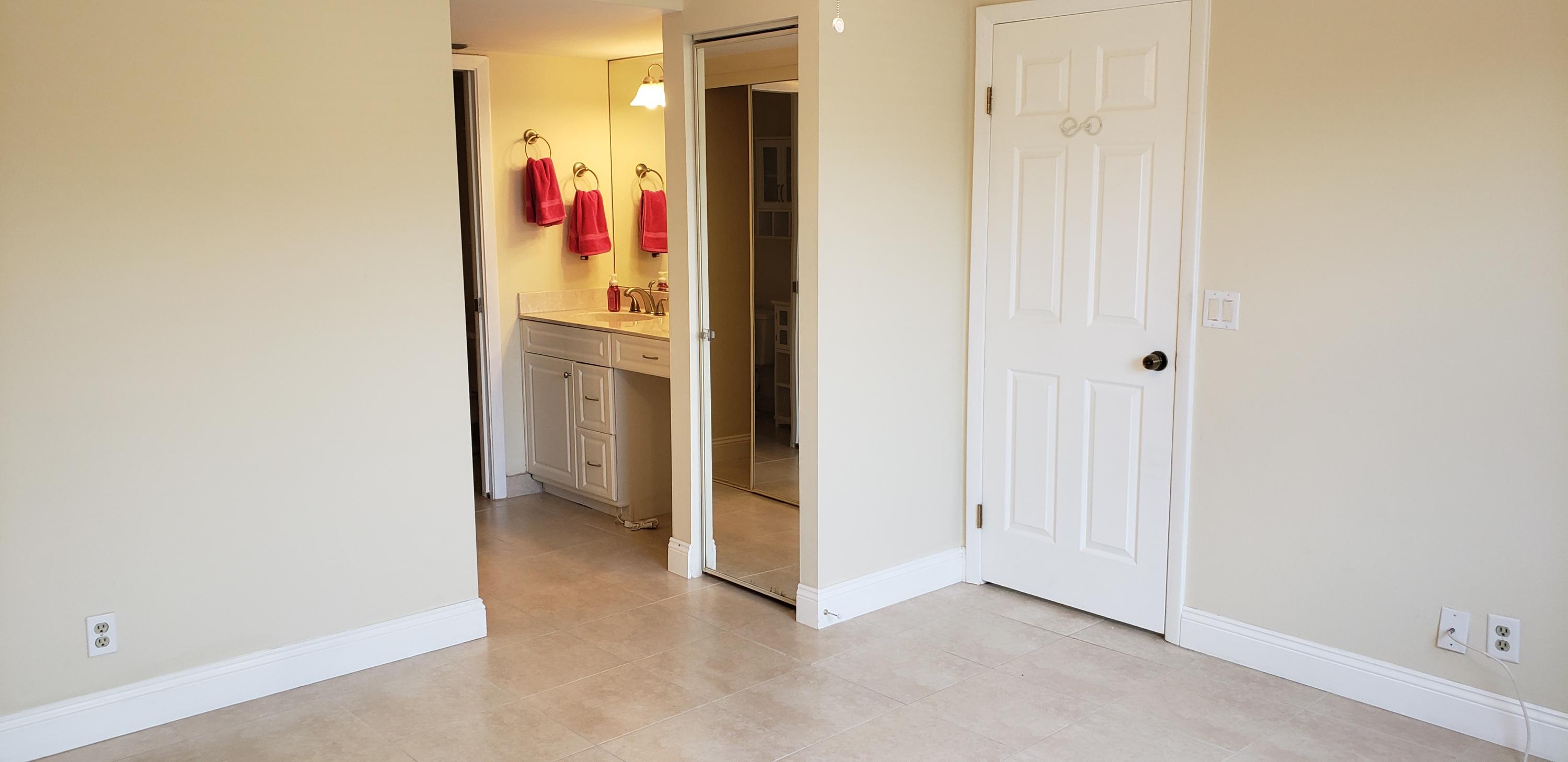 1001 Sabal Ridge Circle, Unit D Palm Beach Gardens, FL 33418 - Photo 13 of 40 Master bedroom