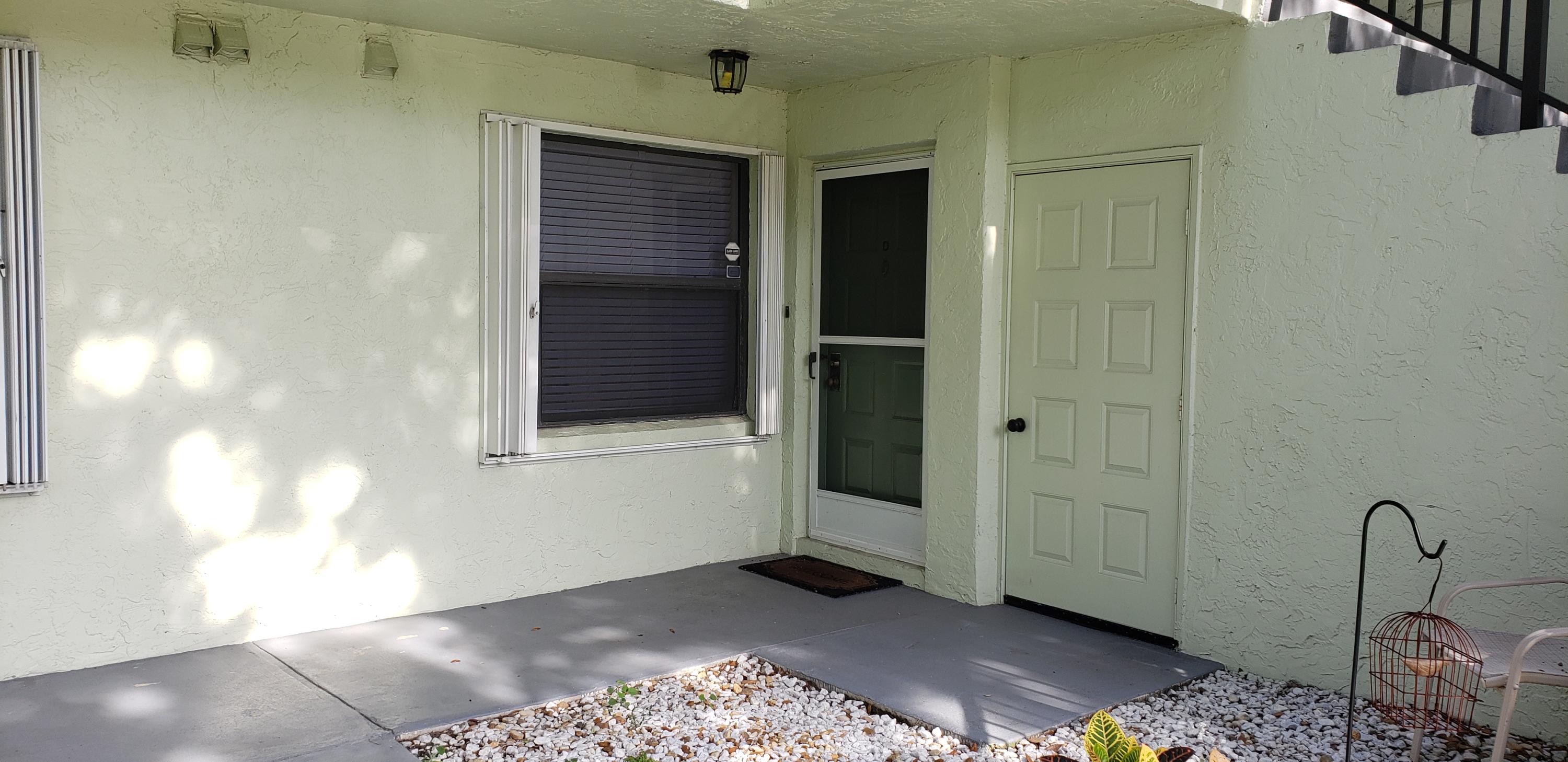 1001 Sabal Ridge Circle, Unit D Palm Beach Gardens, FL 33418 - Photo 32 of 40 Front door