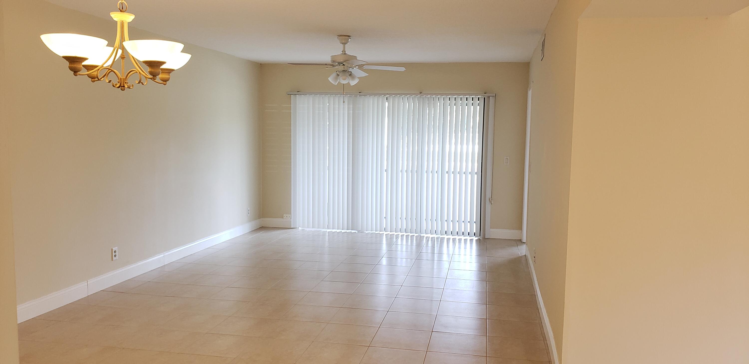 1001 Sabal Ridge Circle, Unit D Palm Beach Gardens, FL 33418 - Photo 8 of 40 Dinning/ living area