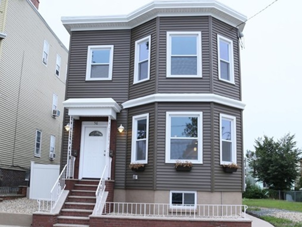56 Byron Street, Unit 2 Boston, MA 02128 - Photo 1 of 17 a front view of a house
