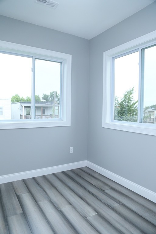 56 Byron Street, Unit 2 Boston, MA 02128 - Photo 9 of 17 a room with a window