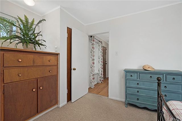 a view of walk in closet with furniture