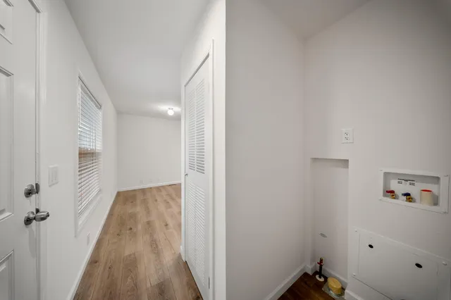 a view of small space with wooden floor