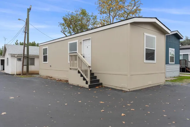 a view of a house with a street