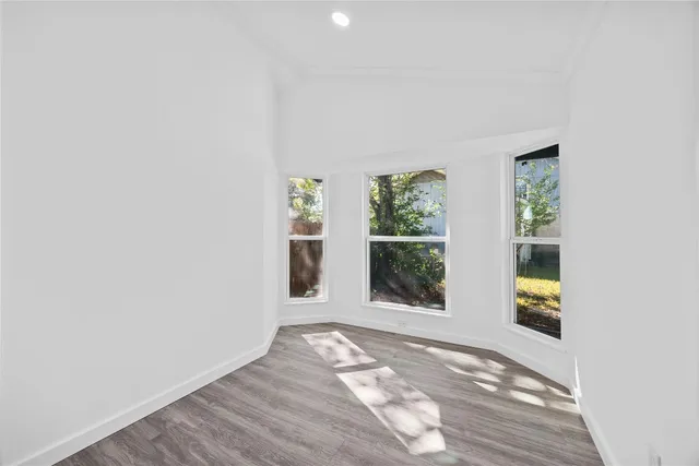 an empty room with windows