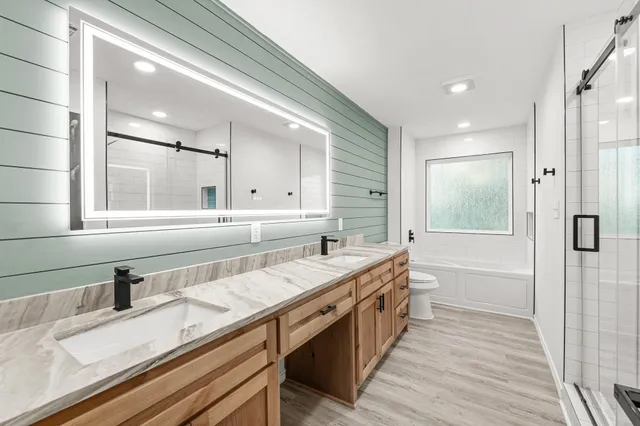 a view of a house with a backyard and a porch