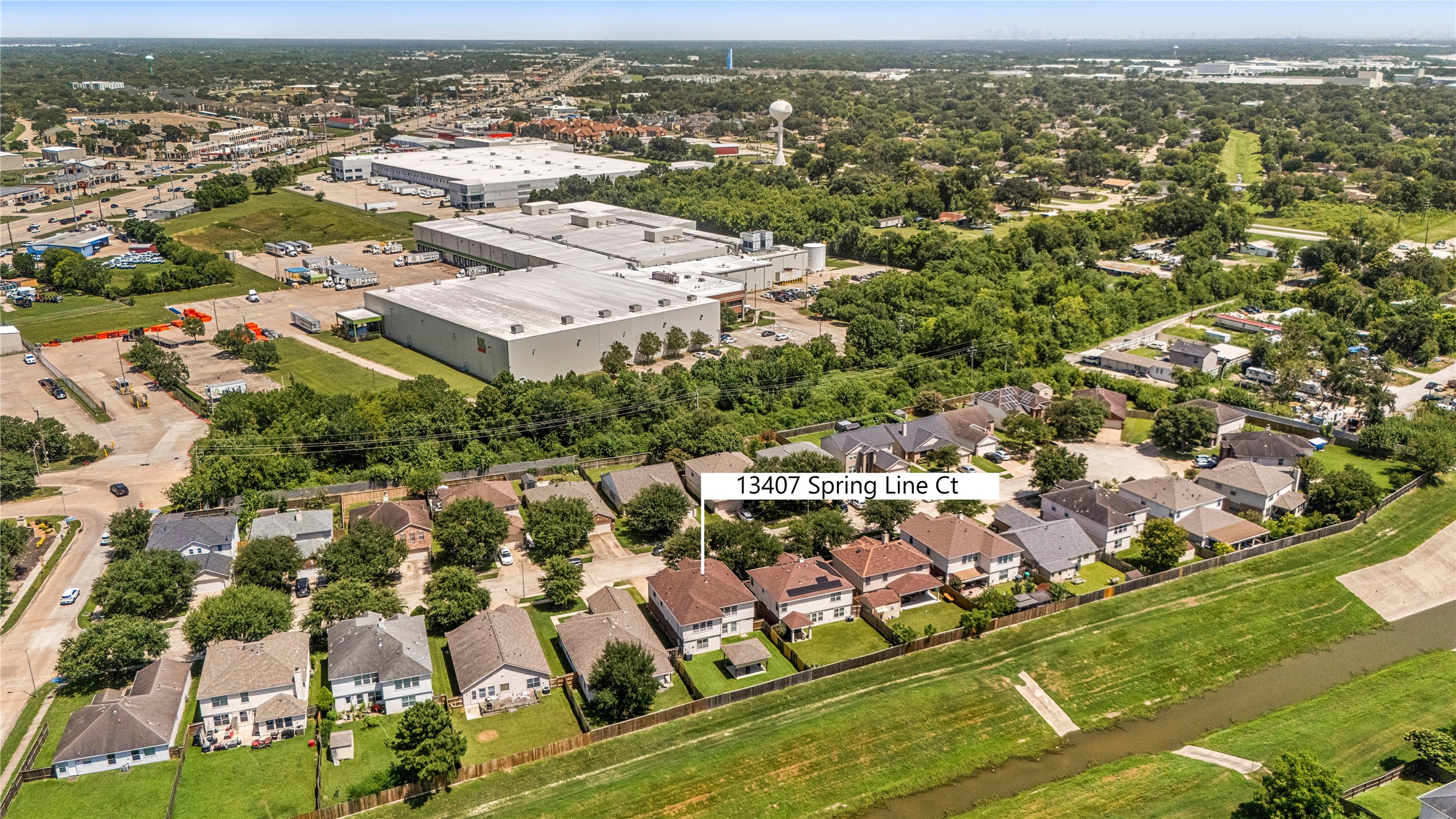 13407 Spring Line Court Houston, TX 77086 - Photo 28 of 29 Additional aerial highlighting the quiet greenbelt and tree reserve buffer. Easy access to SH-249 and Beltway 8.