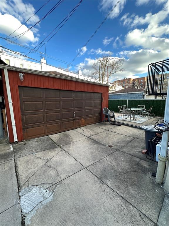7021 Colonial Road Brooklyn, NY 11209 - Photo 12 of 15 a view of a patio with a table and chairs