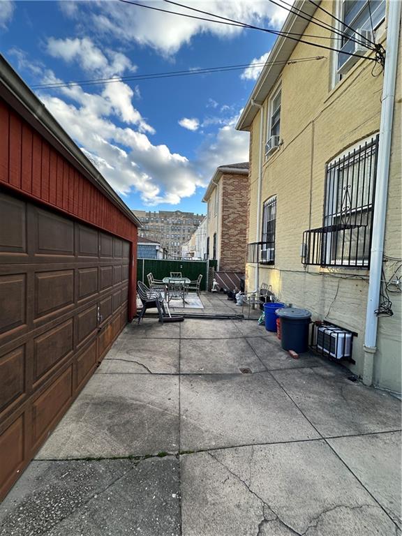 7021 Colonial Road Brooklyn, NY 11209 - Photo 13 of 15 a view of a patio with table and chairs