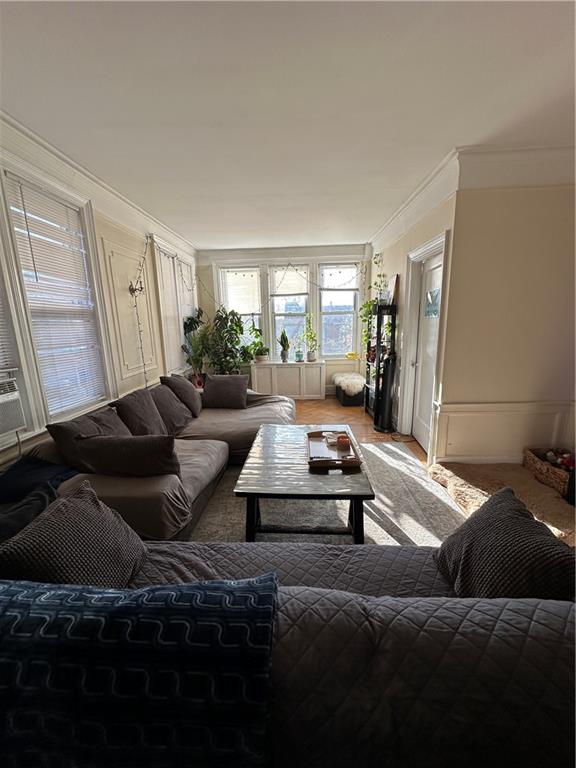 7021 Colonial Road Brooklyn, NY 11209 - Photo 3 of 15 a living room with furniture and a window