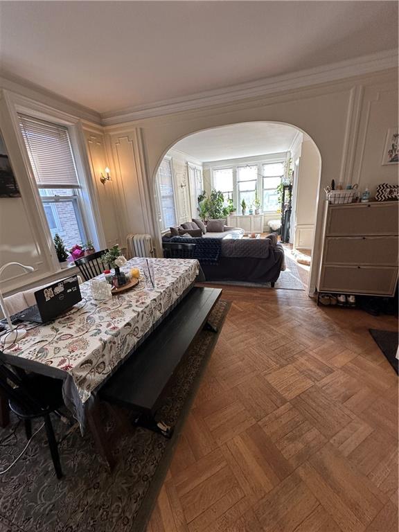 7021 Colonial Road Brooklyn, NY 11209 - Photo 5 of 15 a living room with furniture and a table