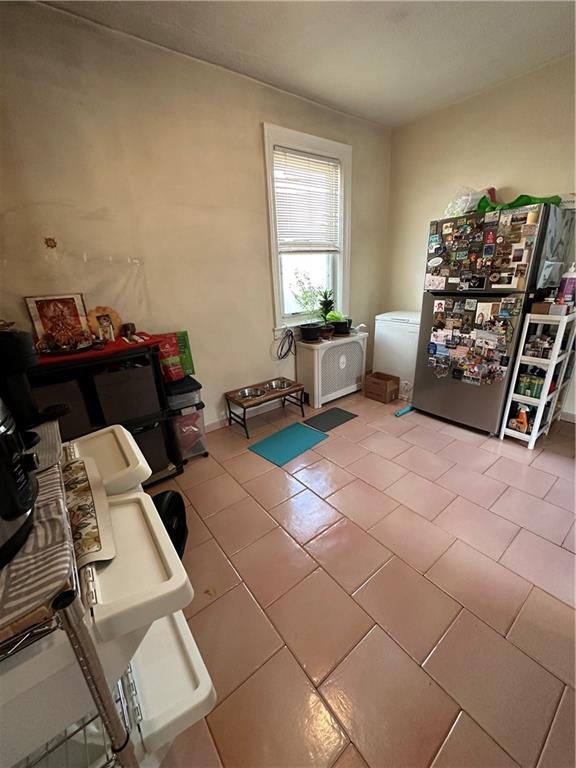 7021 Colonial Road Brooklyn, NY 11209 - Photo 6 of 15 a living room with furniture and a window
