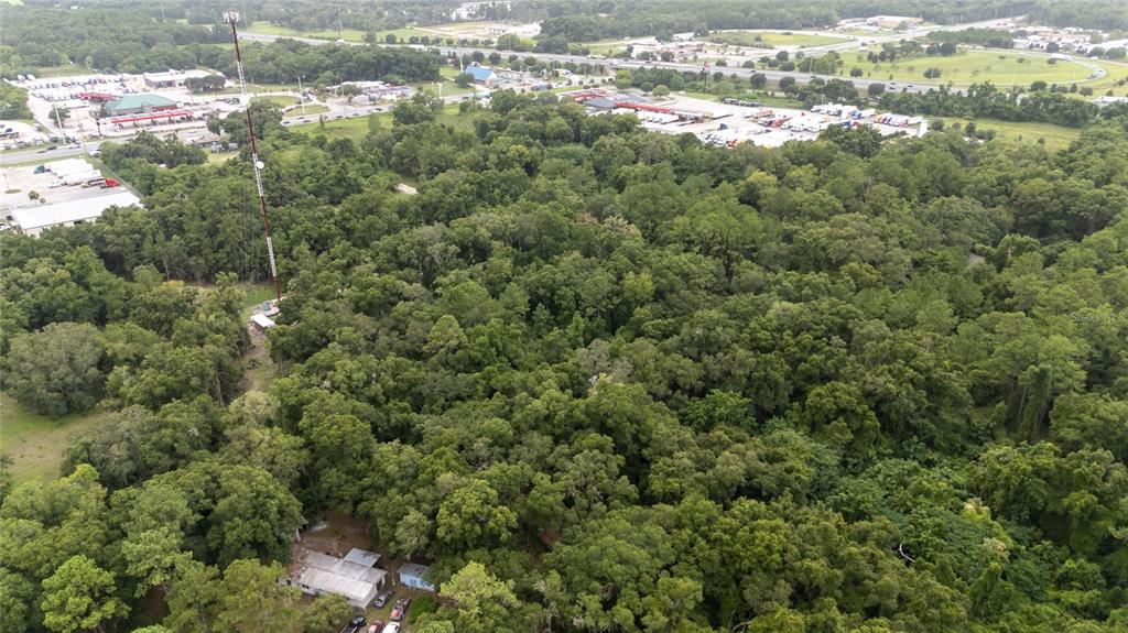 0 Northwest 40th Place Ocala, FL 34482 - Photo 2 of 3 an aerial view of residential houses with outdoor space and trees