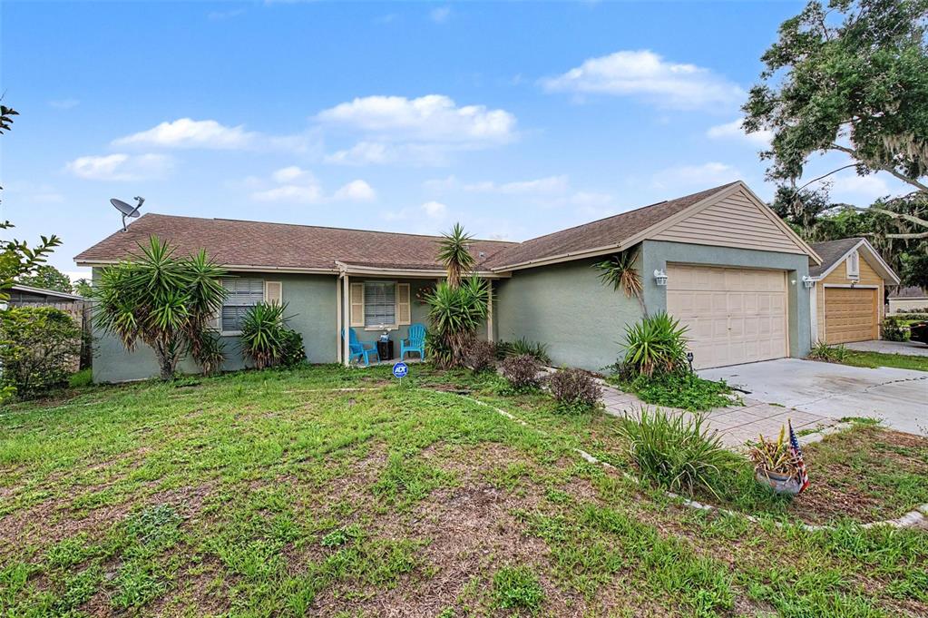1632 Pintail Court Lutz, FL 33549 - Photo 3 of 34 a view of backyard of house with green space