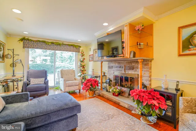 a spacious bedroom with a bed and a large window